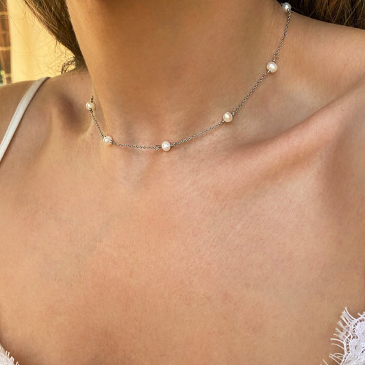 10 Freshwater Pearl Necklace for Woman with silver cable chain on model